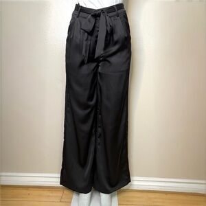 Black satin high waisted wide leg pants with self tie belt